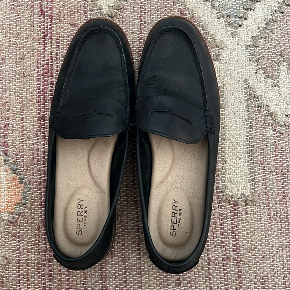 Black leather penny loafers